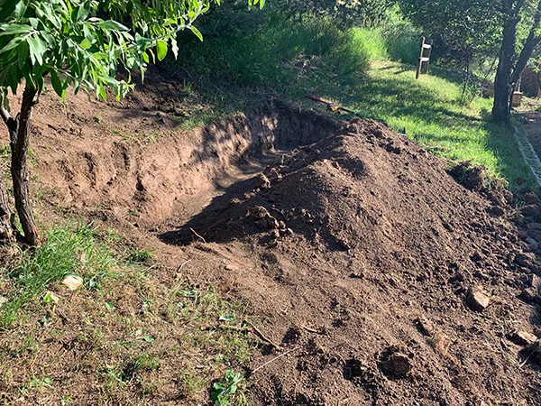 Move all the dirt for a retaining wall