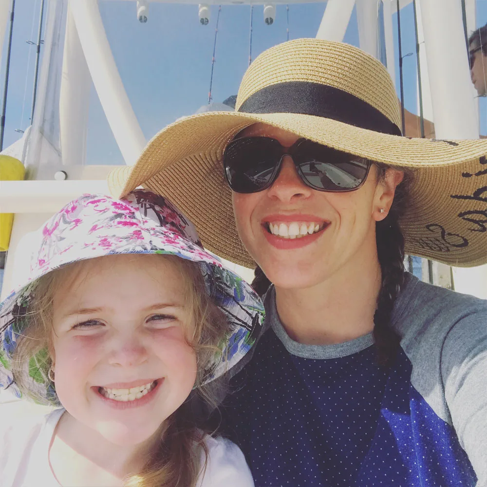 Braids and a wide-brimmed hat to protect and disguise